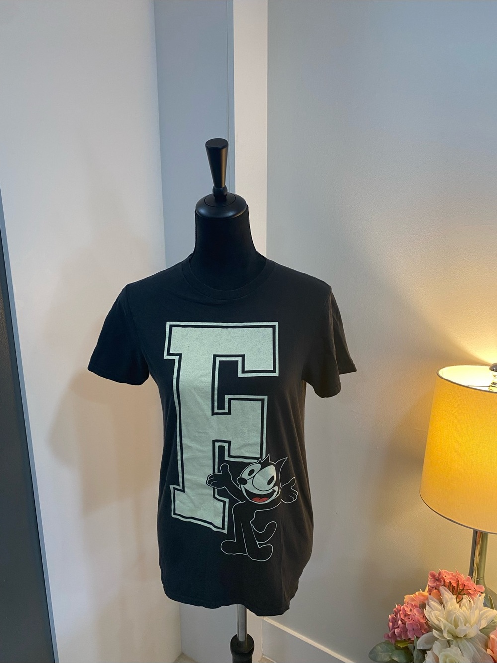 Black Short-Sleeve Graphic Tee with Large 'F' and Felix Motif